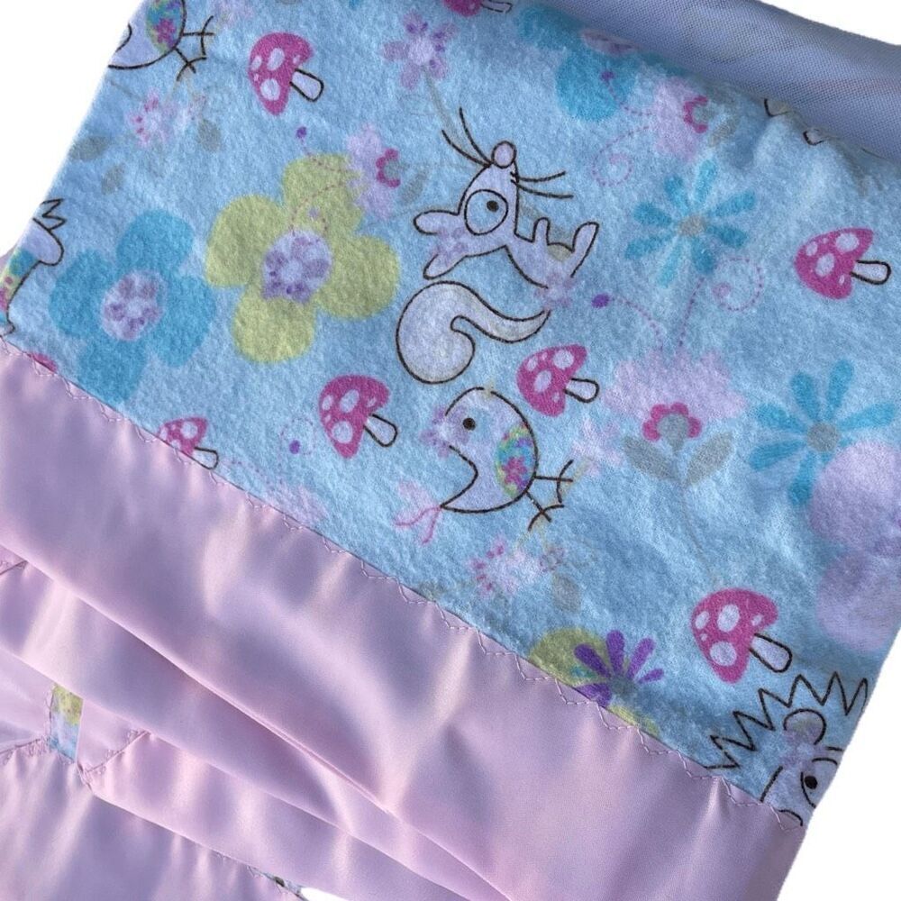 Handmade baby blanket with wide sateen trim. 35 x 38.5